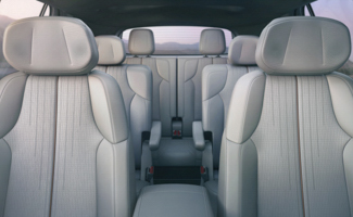 Spacious multi-row Cadillac VISTIQ interior with light-colored seating